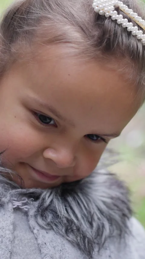 Delightfully Charming Child in Nature Capturing Playful Moments and Memories in Stock Footage 316539500