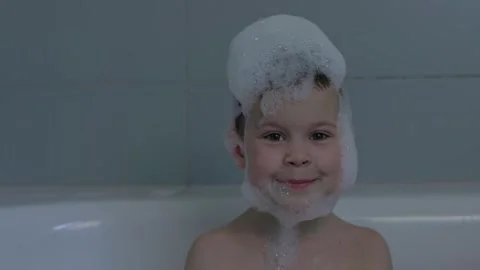 A Delightfully Playful Kid Enjoying an Absolutely Wonderful Time in a Fun Stock Footage 326622016