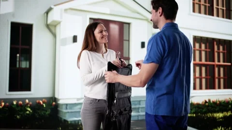 Delivering Dry Cleaning Service Package Stock Footage 305284261