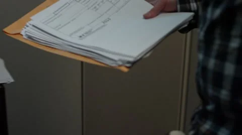 Delivering Paper to Desk Stock Footage 49135600