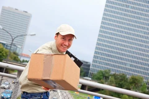 Delivery Boy Standing On A Bridge Stock Photos