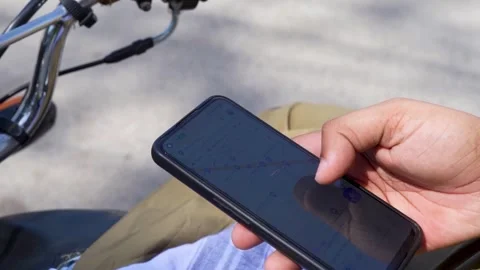 Delivery Boy Using Google maps Navigation Close Up Stock Footage 244298148
