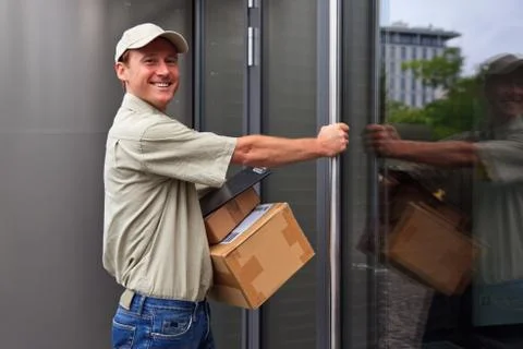 Delivery Boy At Your Door Stock-Fotos
