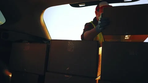 Delivery concept. Courier with parcel. Delivery man holding package in his hands Stock Footage 226324106