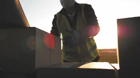 Delivery concept. Courier with parcel. Delivery man holding package in his hands Stock Footage 226327642