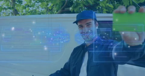 Delivery courier upon arrival signing delivery form, presenting green card with Stock Footage 314752894