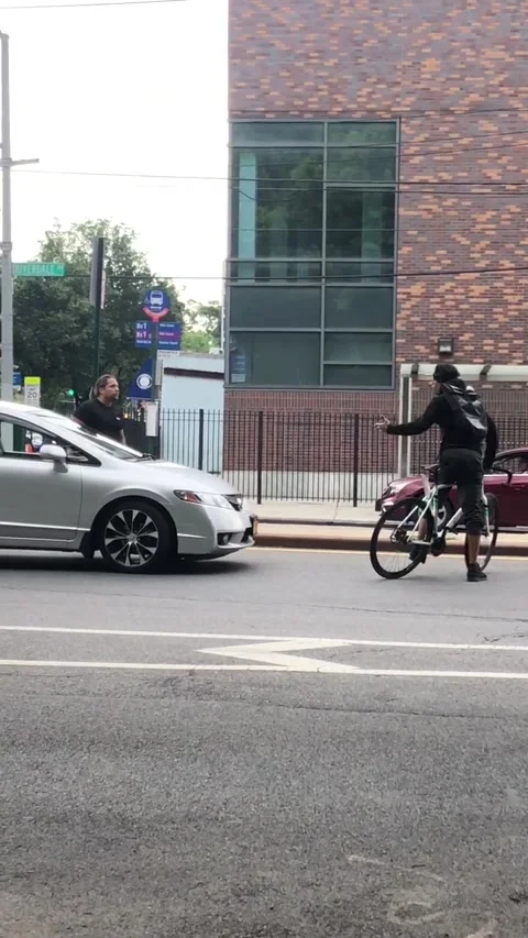 Delivery Driver and Cyclist Try and Destroy Each Others Rides, Bronx, New York,  Stock Footage 205217487