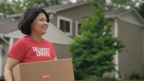 Delivery driver deliver package Stock Footage 202147116