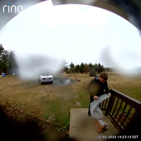 Delivery Driver Protects Competitors Packages From Rain, Laurel, Delaware, USA - Stock Footage 323244190