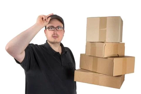Delivery driver with a stack of parcels Stock Photos