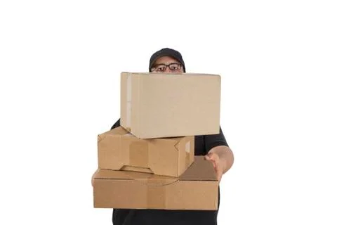 Delivery driver with a stack of parcels Stock Photos