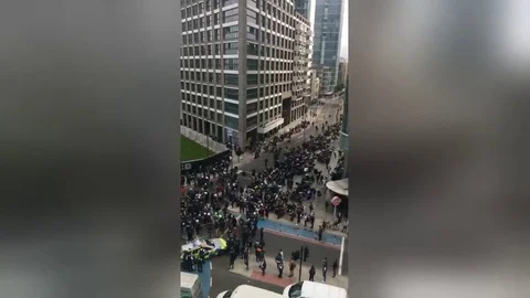 Delivery drivers protest outside Uber headquarters over pay Stock Footage 106315367