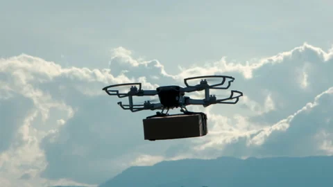 Delivery drone fly with package box on blue sky Stock Footage 164233154