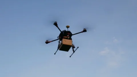 A Delivery Drone Transport Package Stock Footage 120211667