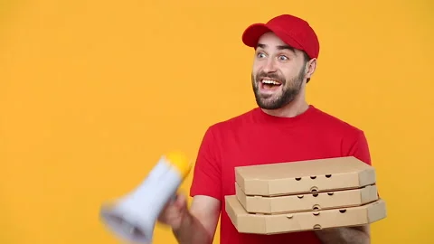Delivery fun guy man in red cap t-shirt uniform workwear hold order pizza box Vidéo 136282244