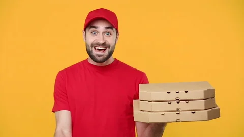 Delivery fun guy man in red cap t-shirt uniform workwear hold order pizza box Stock Footage 136282246