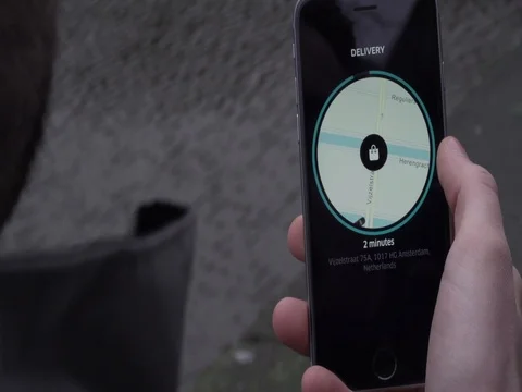 Delivery guy checks smartphone app06 Stock Footage 75764543