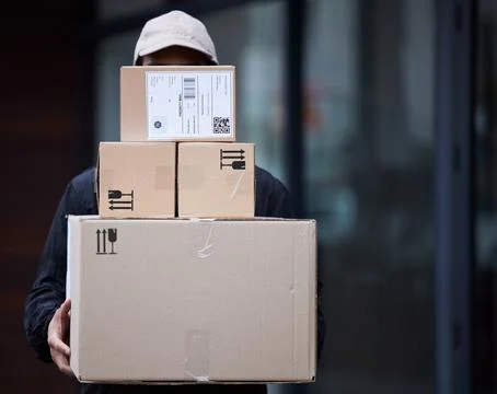 Delivery guy package, shipping boxes and export employee with courier service Foto stock