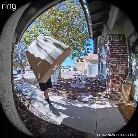 Delivery Guy Precariously Places New TV Package, Victorville, California, USA -  Stock Footage 320913962