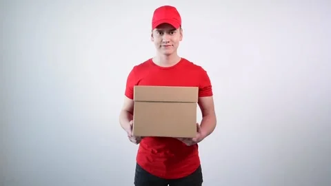 A delivery guy is ringing an imaginary door. Parcel delivery. Shopping online. Stock Footage 132630004