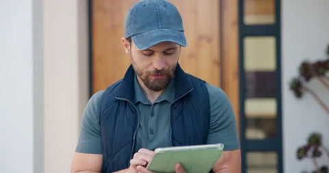 Delivery, house and man with tablet for shipping, order update and digital Stock Footage 335798374