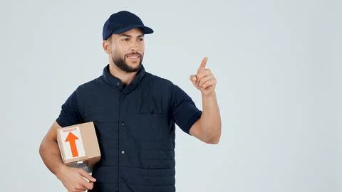 Delivery man, box and pointing at space for shipping guide, info or steps f.. Stock Photos