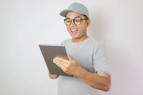 Delivery man checking list on tablet. Stock Photos