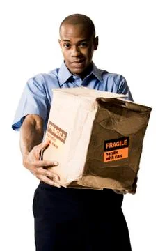 Delivery man with damaged package Foto stock