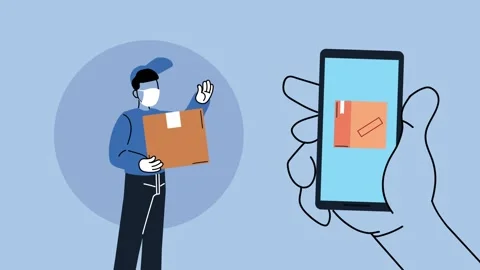 Delivery man with face mask holding cardboard box and hand holding smartpho.. 库存影片 339210556