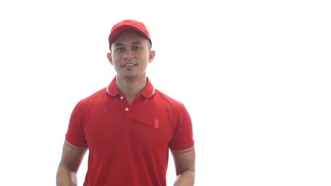 Delivery man holding parcel boxes while presenting 스톡 동영상 91312402