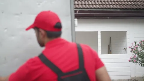 Delivery man move items to the house. 스톡 동영상 245283857