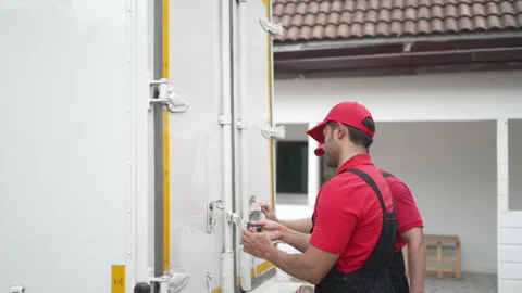 Delivery man move items to the house. 스톡 동영상 245283882