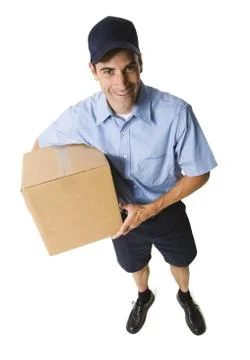 Delivery man with package Stock Photos