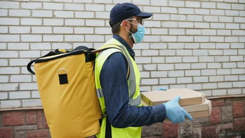 Delivery man working in a pandemic Stock Footage 130193481