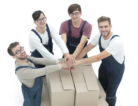 Delivery men carrying stack of boxes. Isolated on white Stock Photos
