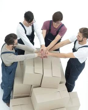 Delivery men carrying stack of boxes. Isolated on white 스톡 사진