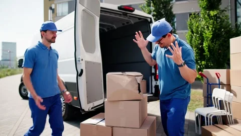 Delivery Mishap: Box Smashed By Careless Mailman Stock Footage 312900040
