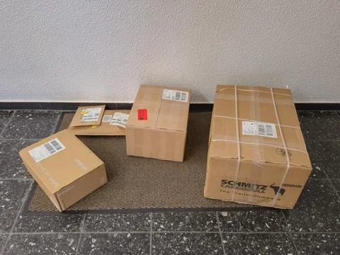 Delivery of Multiple Packages Directly at the Doorstep for Your Convenience.. Stock Photos