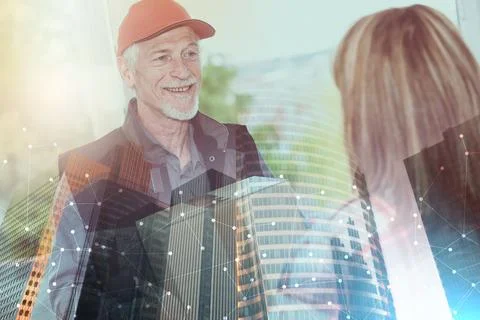 Delivery of a package by a deliveryman, light effet; multiple exposure Stock Photos