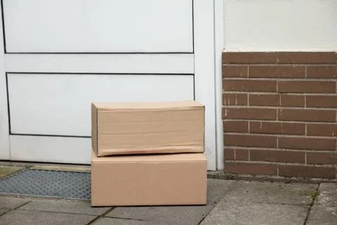 Delivery Of Parcel Boxes At Doorstep 写真素材