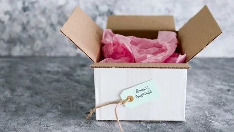 Delivery parcel from online orders with small business tag on them, customer  Stock Footage 154225713