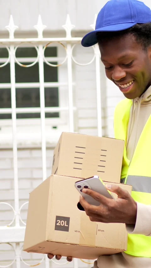 Delivery person using GPS to determine customer's address Stock Footage 284511084
