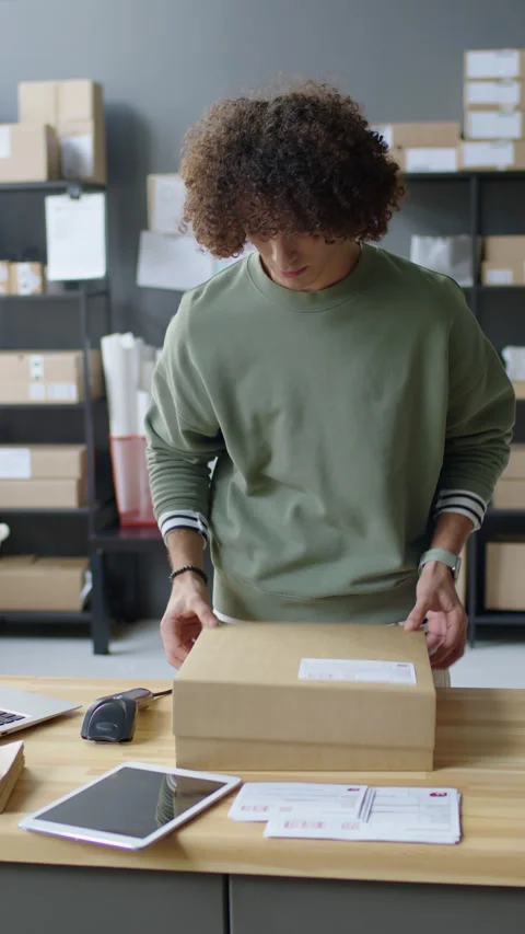 Delivery Service Worker Packing and Scanning Parcel 動画素材 228479728