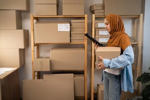 Delivery SME idea concept. Startup SME small business entrepreneur Muslim wom Stock Photos