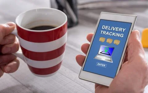 Delivery tracking concept on a smartphone Stock Photos