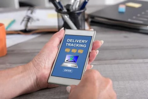 Delivery tracking concept on a smartphone Stock Photos