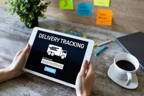 Delivery tracking form on device screen. E-commerce and business concept. Stock Photos