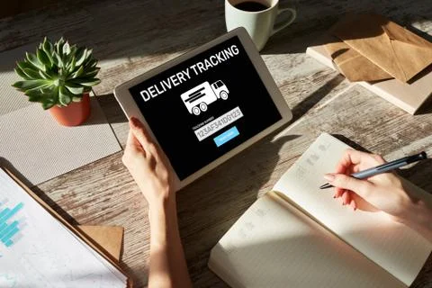 Delivery tracking form on device screen. E-commerce and business concept. Stock Photos