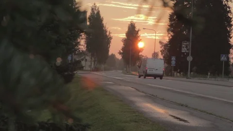 Delivery Van Drives Away in a Small Town During the Sunset Vidéo 80929444