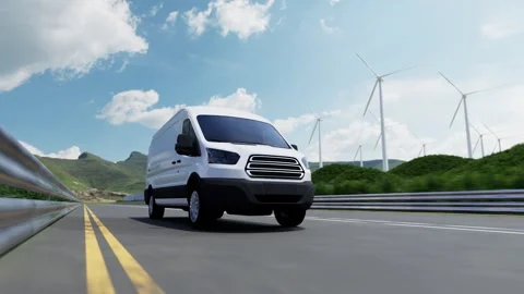 Delivery van driving on highway with wind turbines and solar panels Stock Footage 331536500